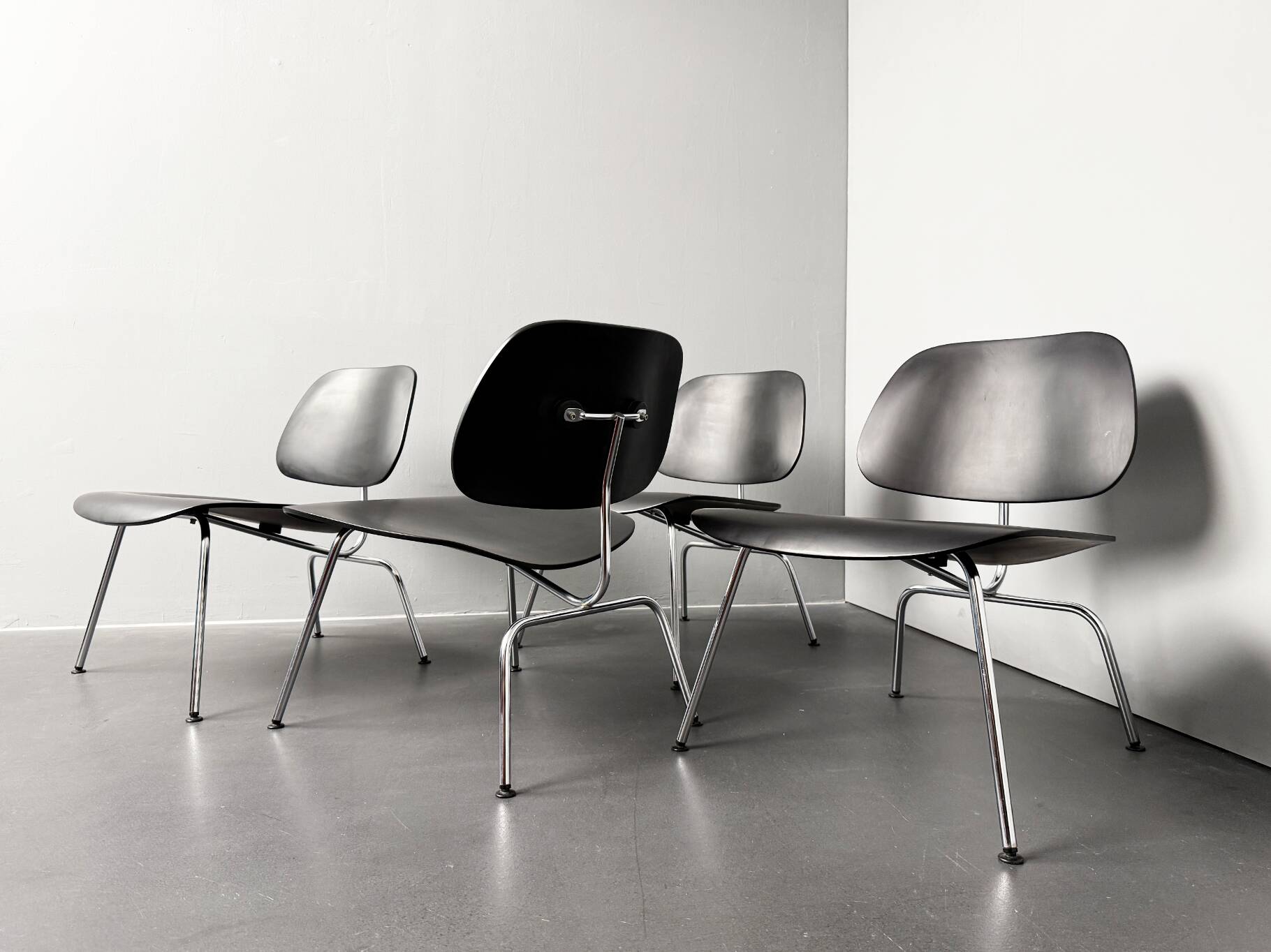 Set of 4 LCM chairs made of chrome-plated metal with black plywood by Charles & Ray Eames for Herman Miller, Germany, 1960s