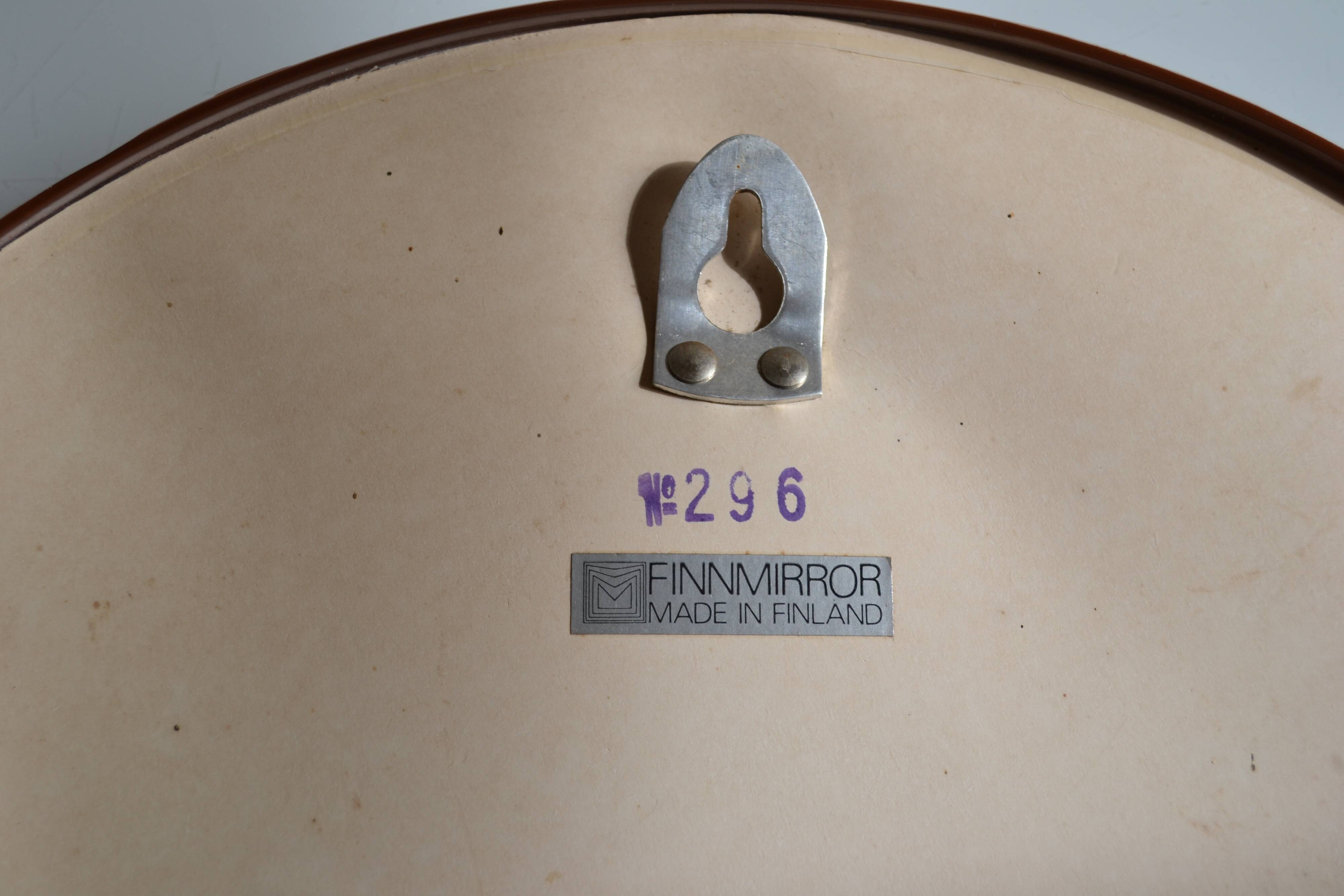 Scandinavian round mirror from the 70s brown plastic Finnmirror made in Finland