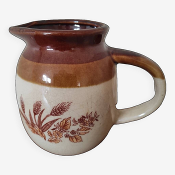 Glazed ceramic pitcher