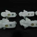 8 porcelain knife rests - Cherubs