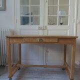Vintage kitchen table on casters.