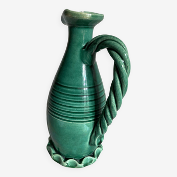 Small green ceramic pitcher