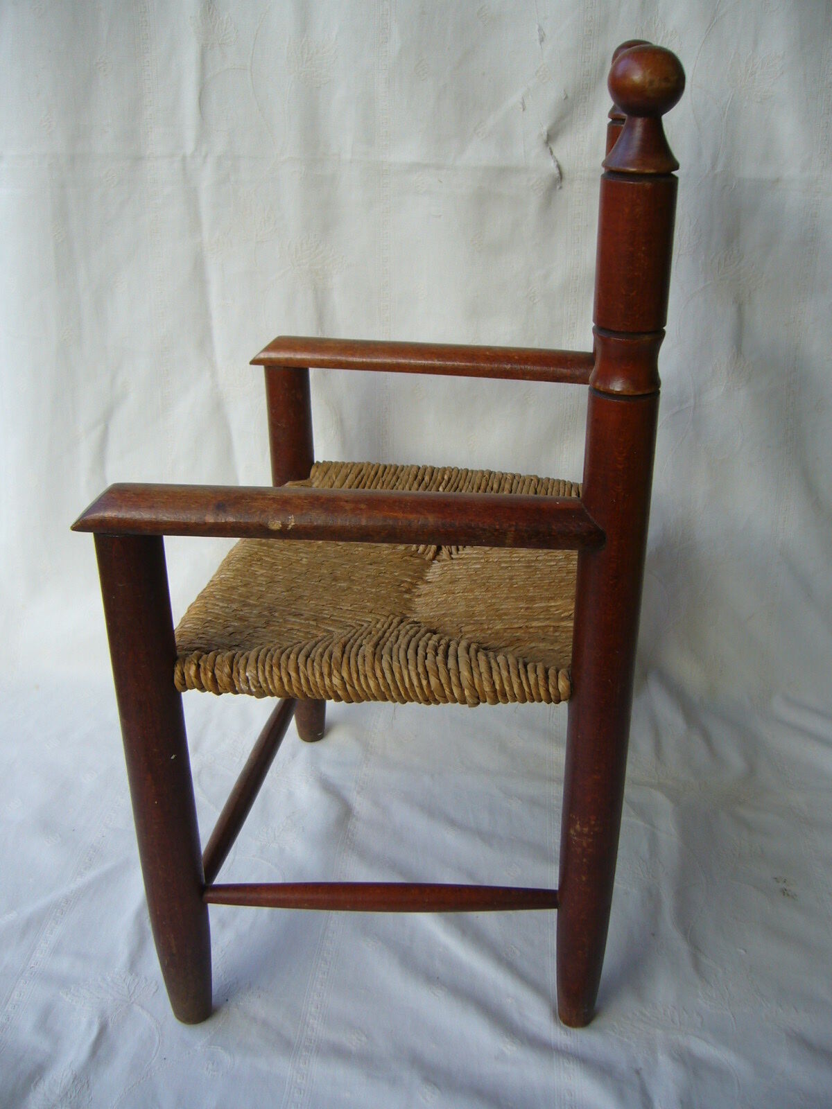 Wooden child's chair and mulched seat