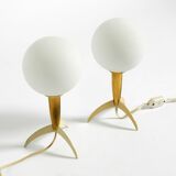 Two Mid-Century Modern rocket table lamps in brass and glass