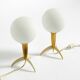 Two Mid-Century Modern rocket table lamps in brass and glass