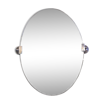 Large oval bevelled mirror and silver metal fasteners 44x60cm