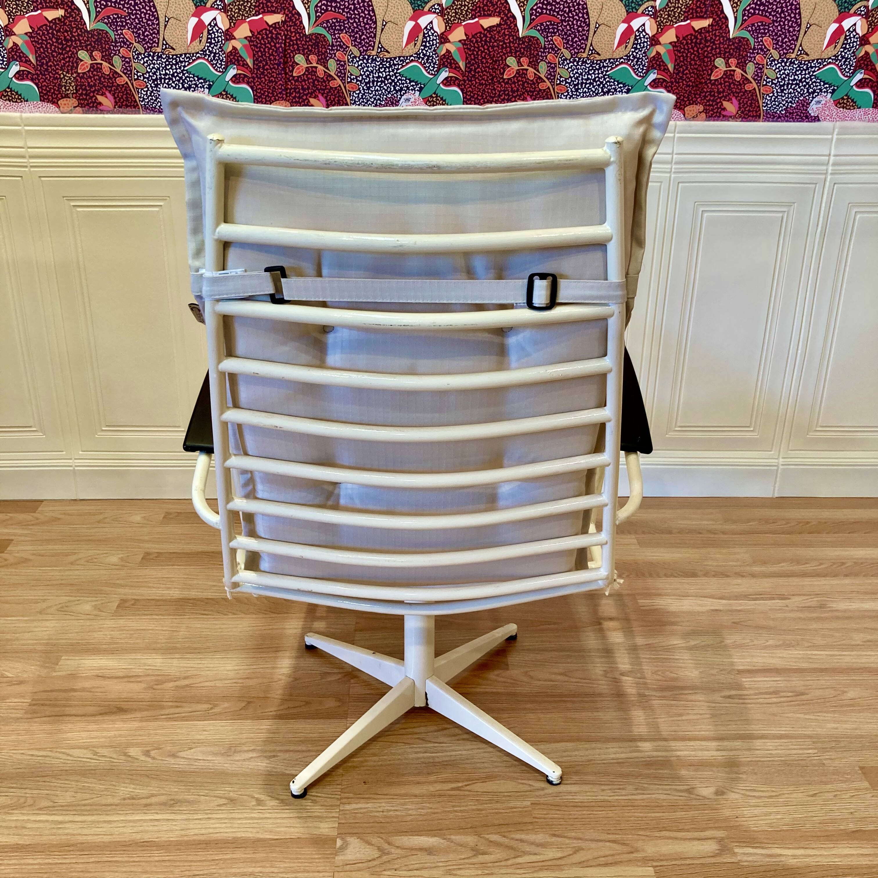 Metal and Bakelite swivel armchair, 1960s design.