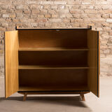 Vintage low sideboard restyled in blue with 2 swing doors and wooden base