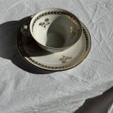 Set of 9 vintage turquoise deep plates with gold trim and pink flowers.