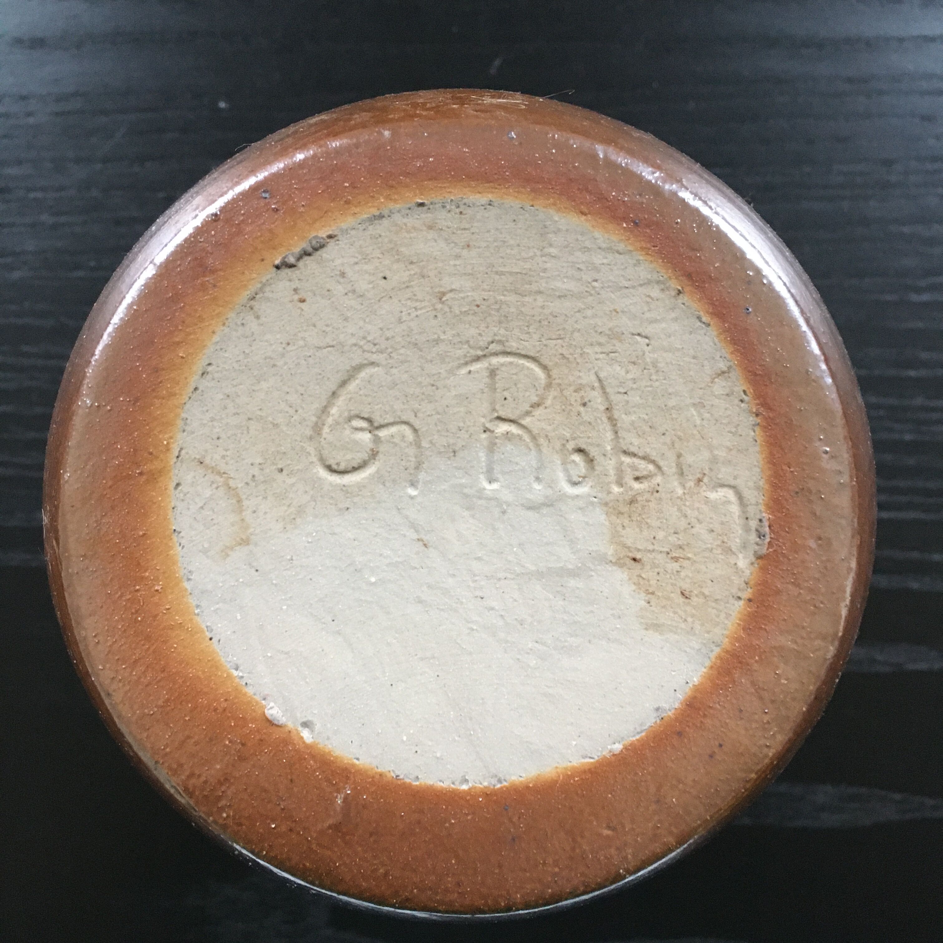 Signed vase in polished stoneware