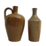 Set of two enamelled stoneware bottles.