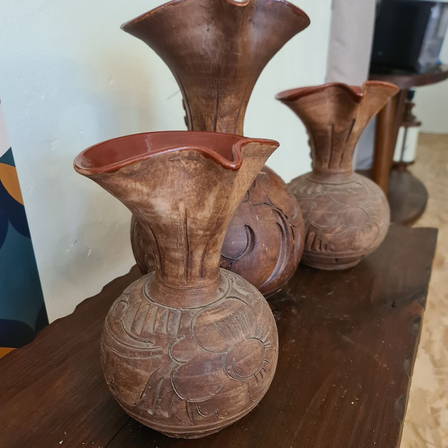 Set of carved terracotta pitchers