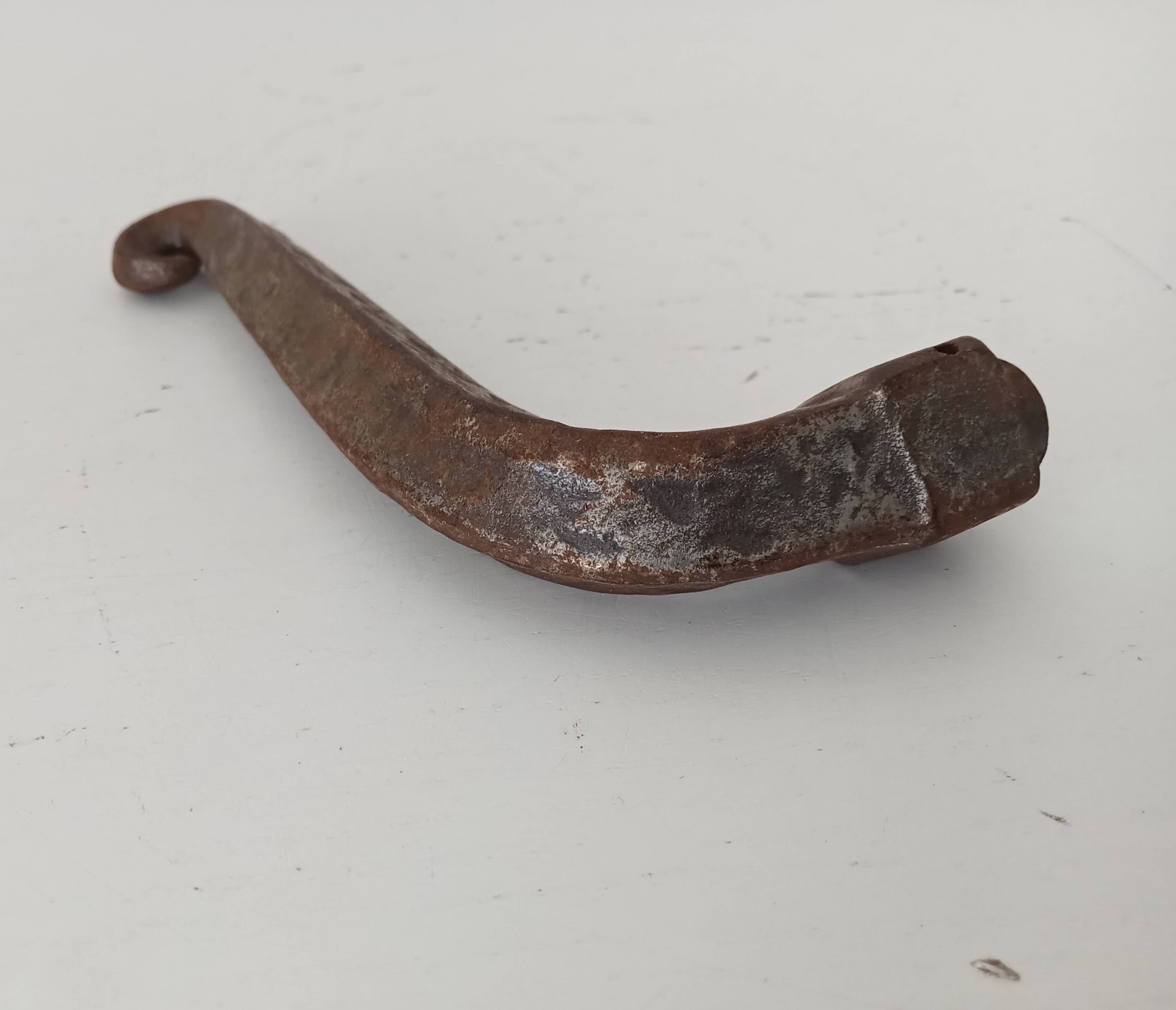 19th-century antique door handle in forged steel