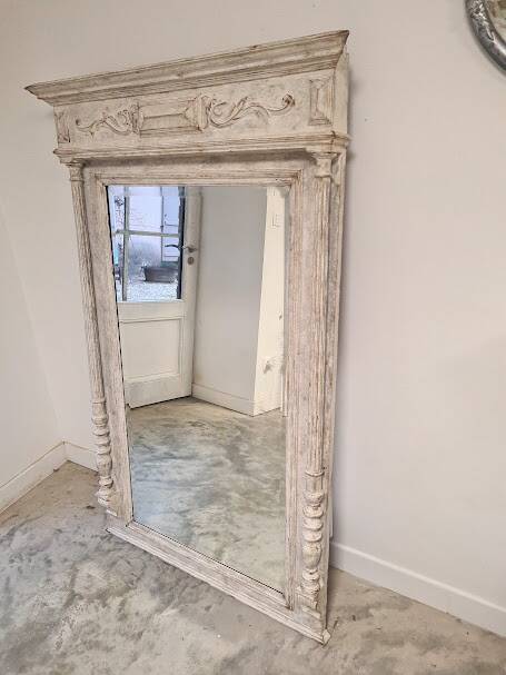 Beveled mercury patinated trumeau mirror