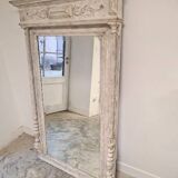 Beveled mercury patinated trumeau mirror