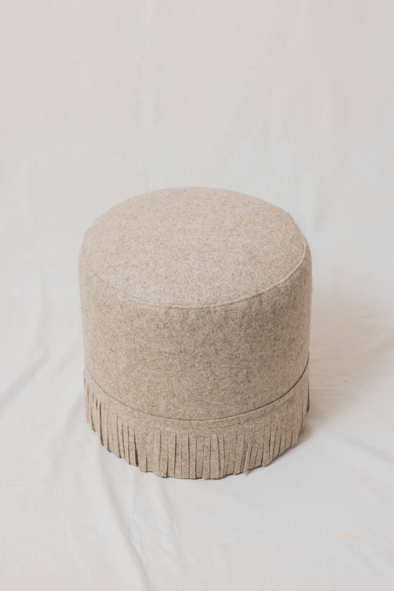 Pair of wool poufs