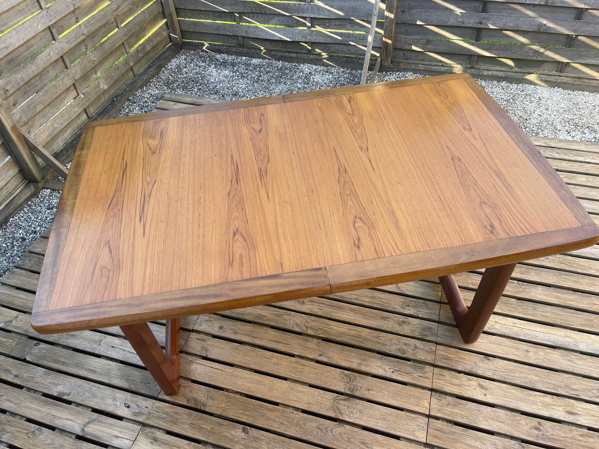 Extendable teak table, sled base, vintage style.