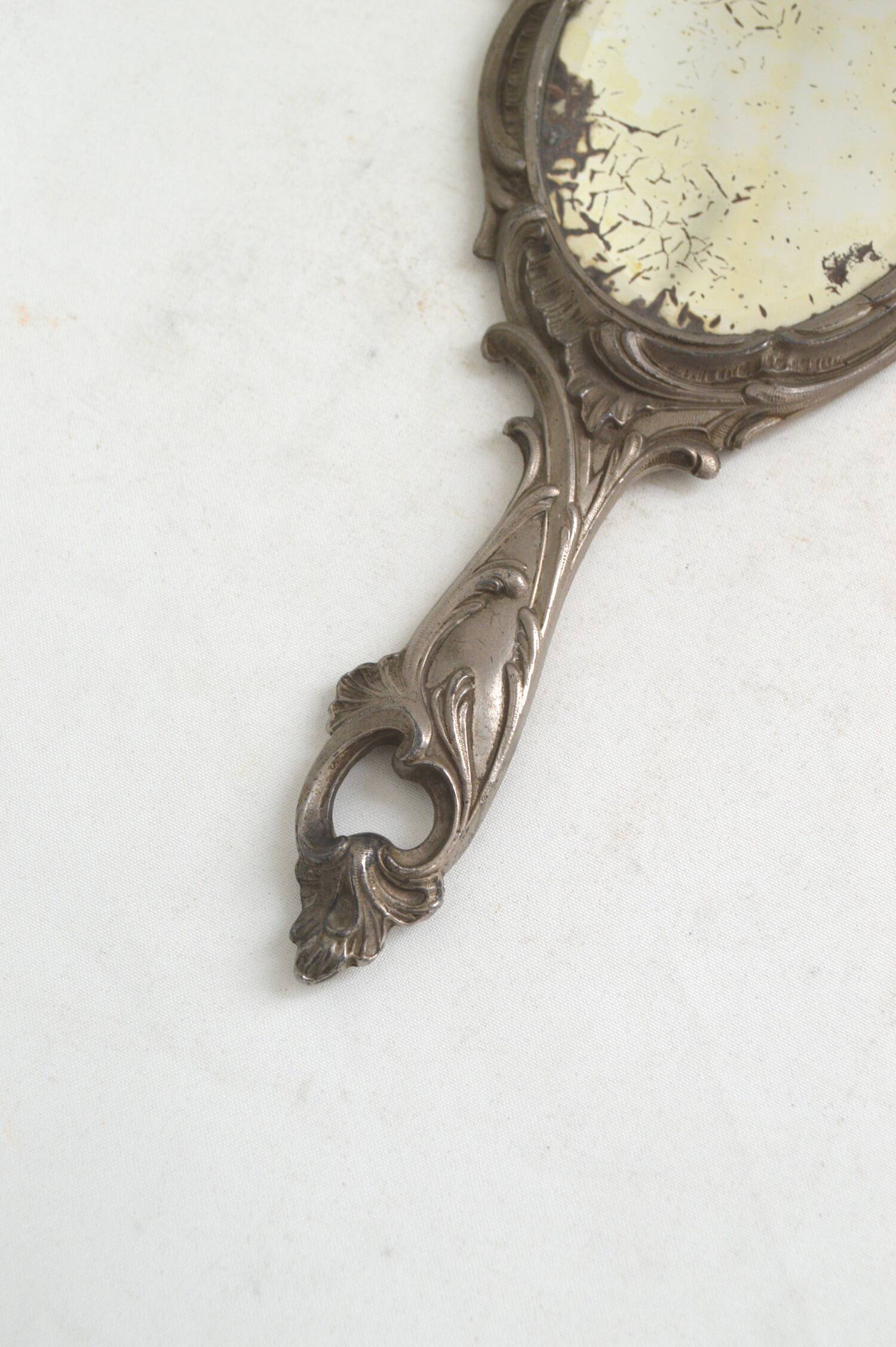 Pewter hand mirror