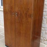 Wardrobe on a plinth in walnut and walnut veneer circa 1940.