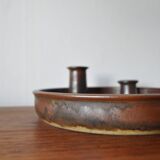 Candle holder made of stoneware with a harefur glaze