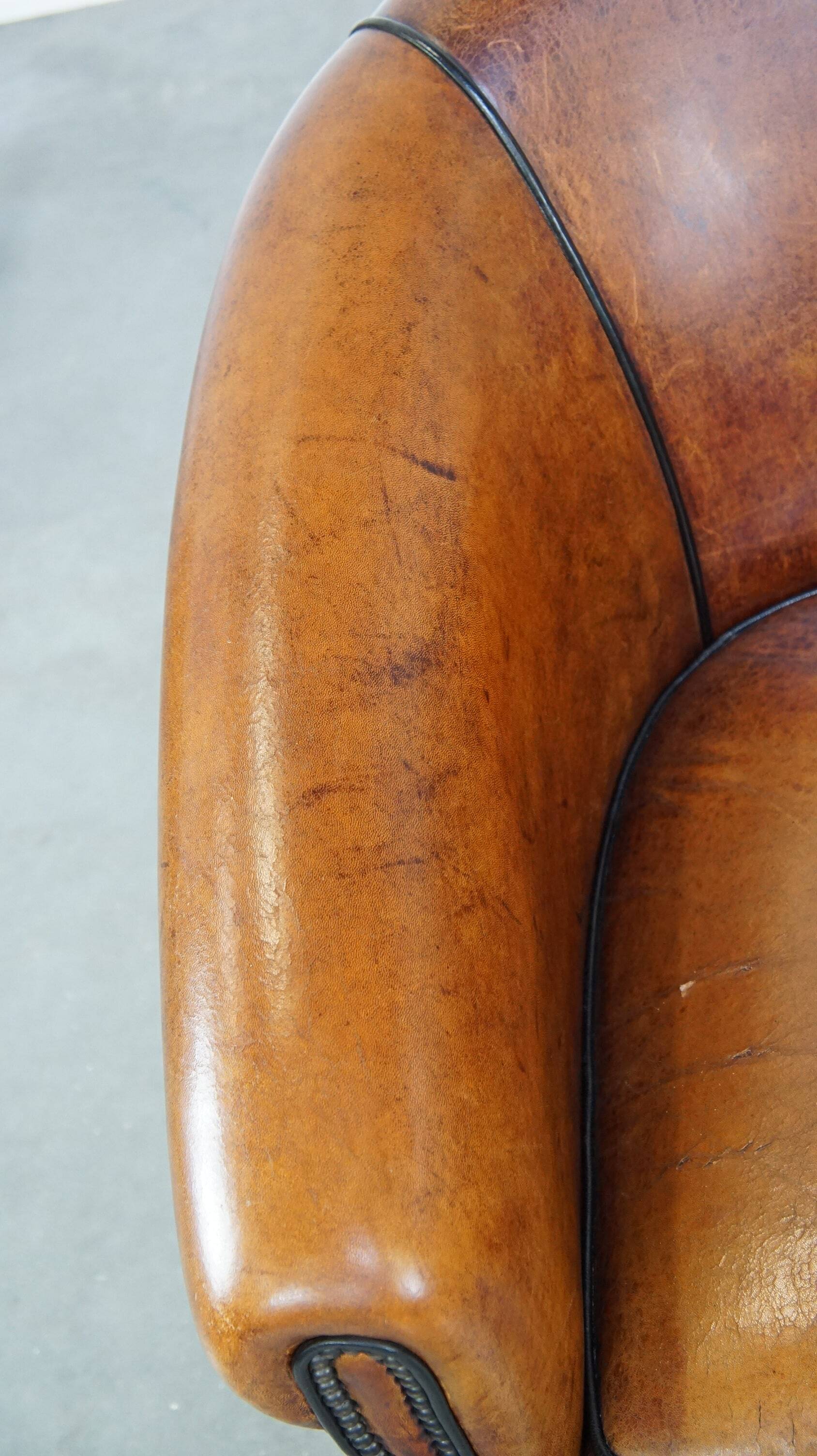 Fauteuil club vintage en cuir de mouton