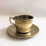 Silver metal cup and saucer