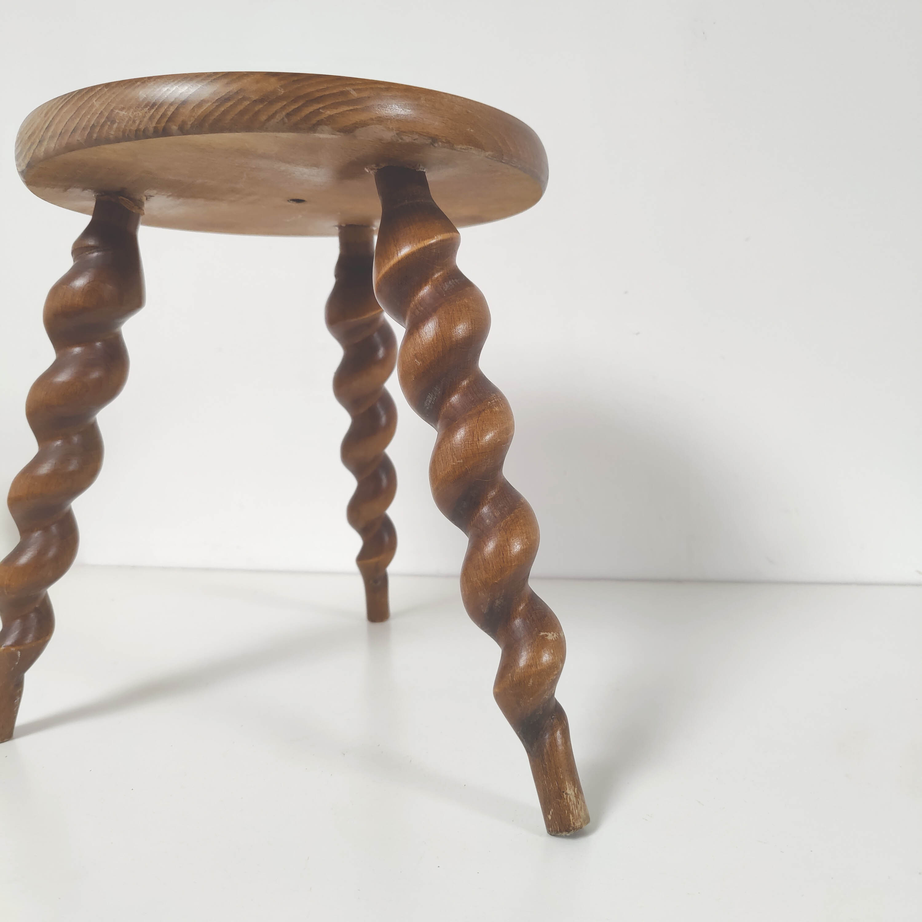 Wooden tripod stool