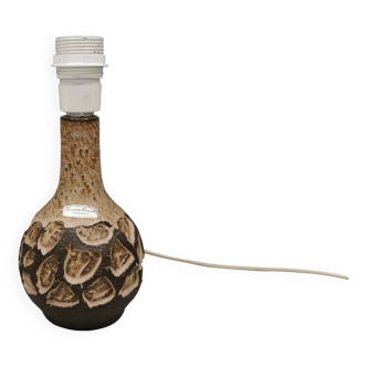 Small beautiful ceramic table lamp in earth colors.