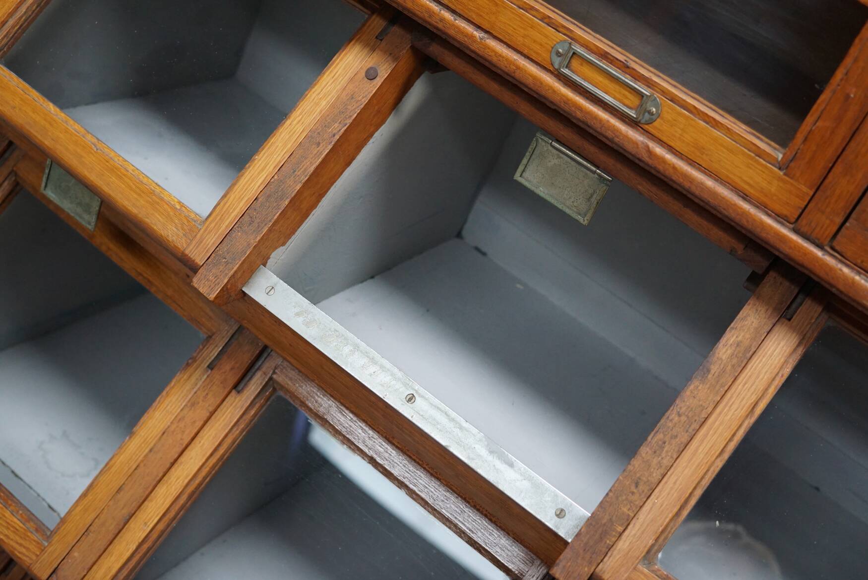 Very large Dutch oak showcase for grocery or haberdashery, 1920s-1930s