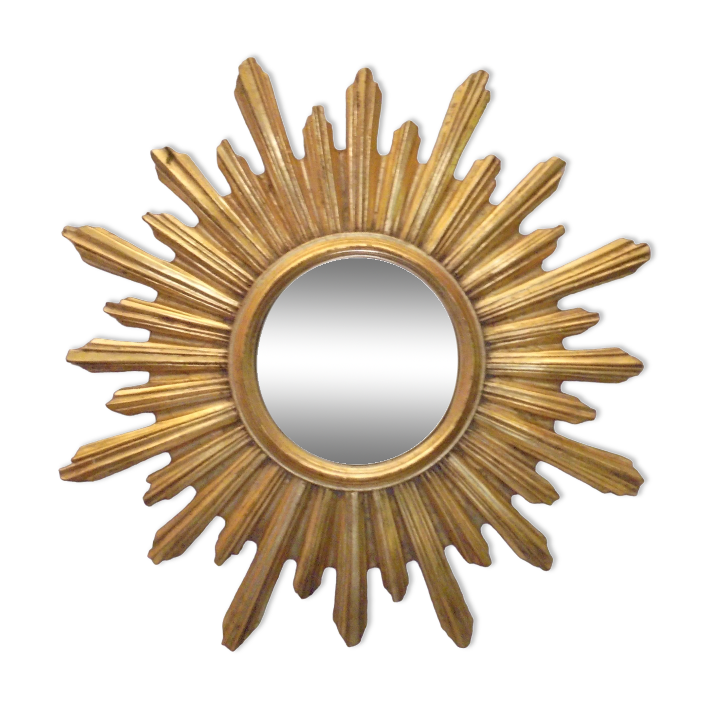 Sun mirror in golden resin from the 70s