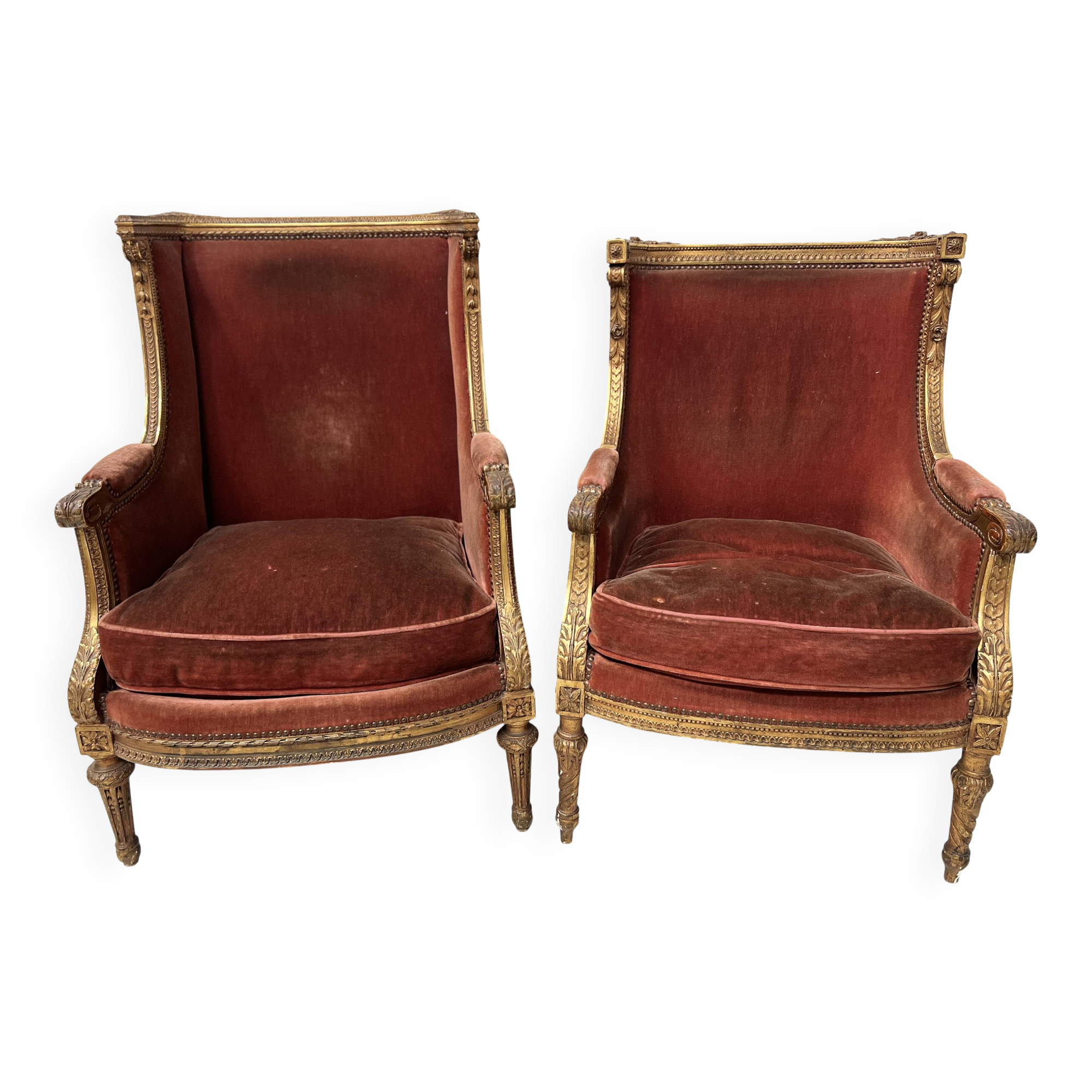 Two Louis XVI style wing chairs in gilded wood, 20th century
