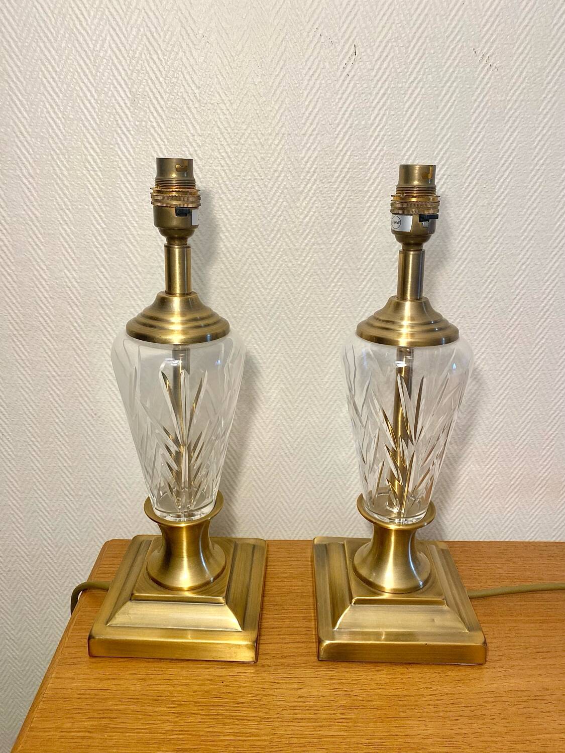 Pair of lamp bases in brass and cut glass.