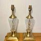 Pair of lamp bases in brass and cut glass.