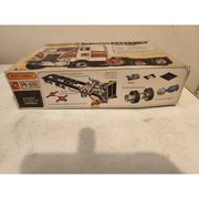2 boxes of vintage toys