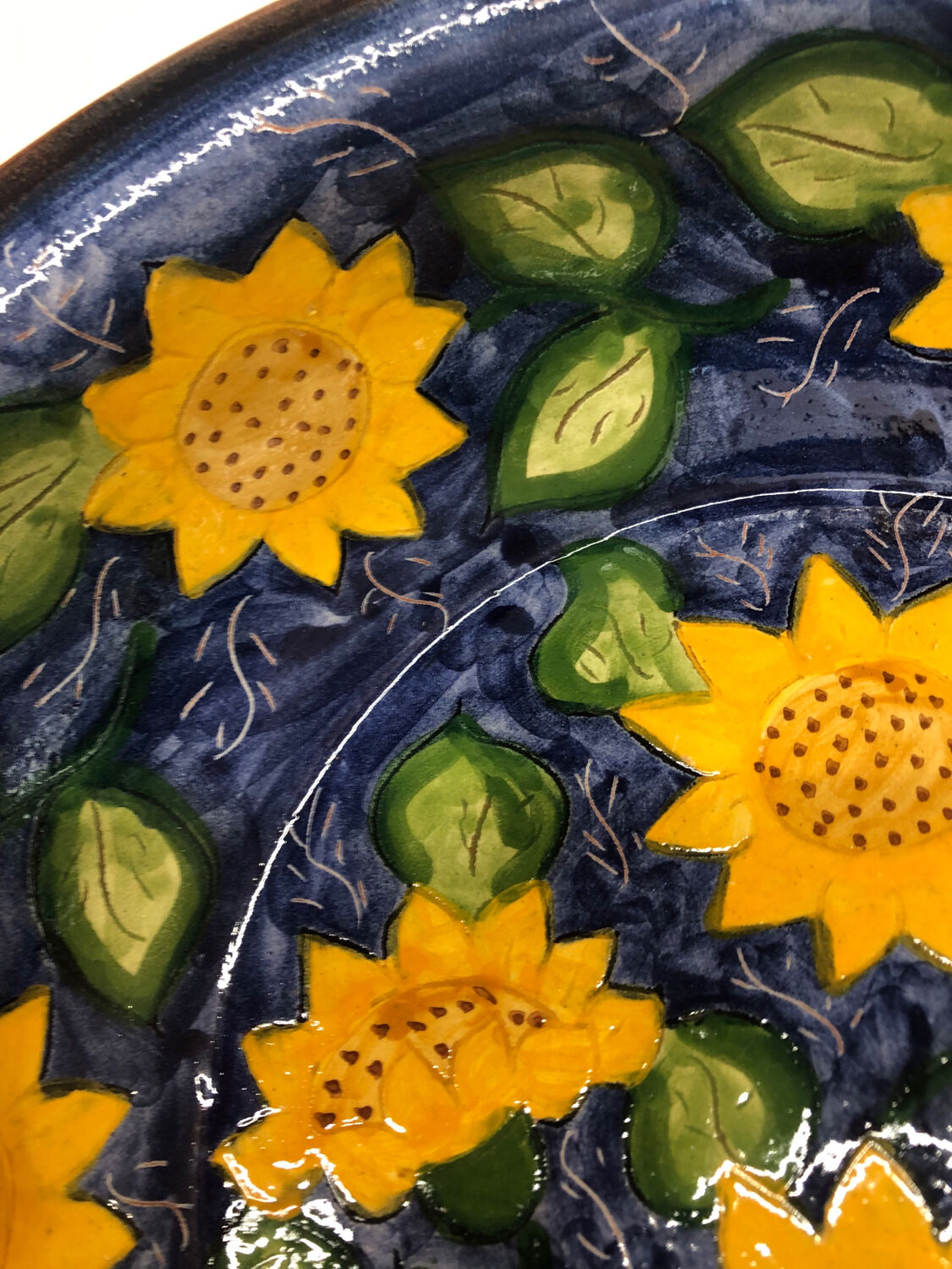 Portuguese ceramic dish decorated with sunflowers