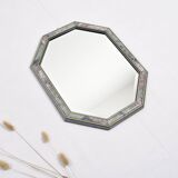 Old octagonal beveled mirror.
