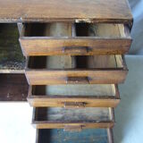 Antique, artisanal seven-drawer furniture