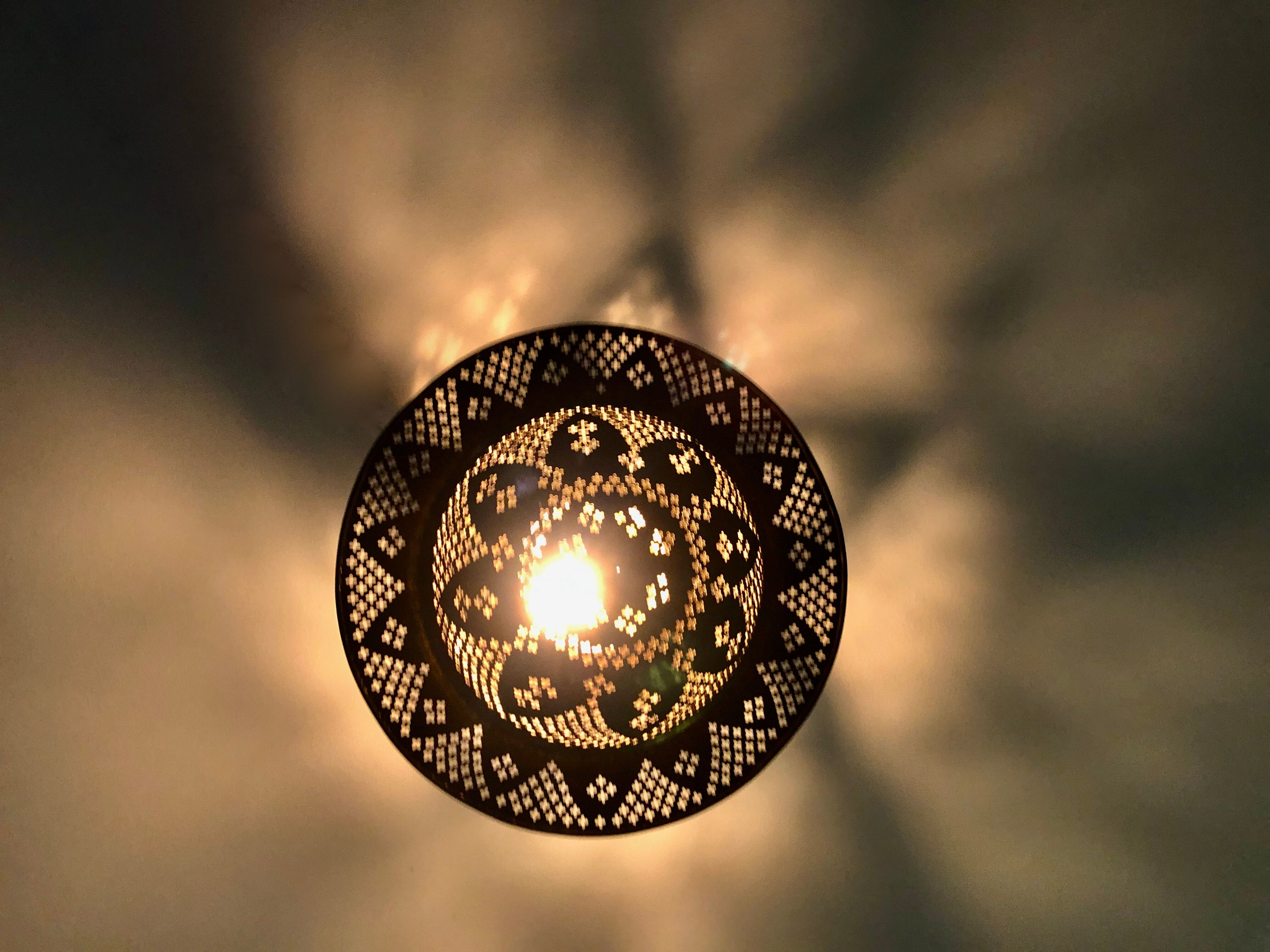 Perforated gilded metal lantern