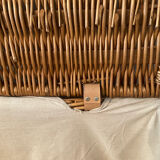 Woven wicker vintage suitcase