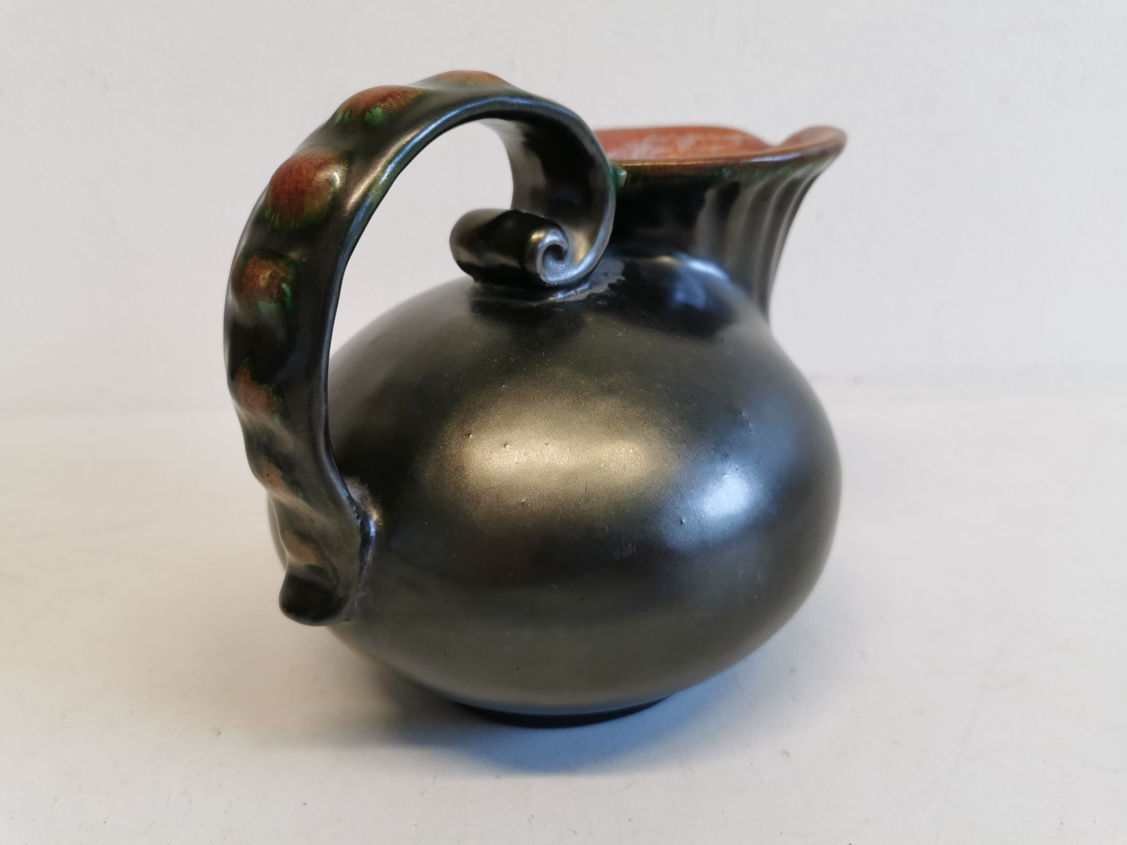 Keramic jug in metal glaze, from Danish Michael Andersen (Stamped with the 3 fish at the bottom)