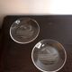 Hermès pair of glass plates with a dolphin pattern.