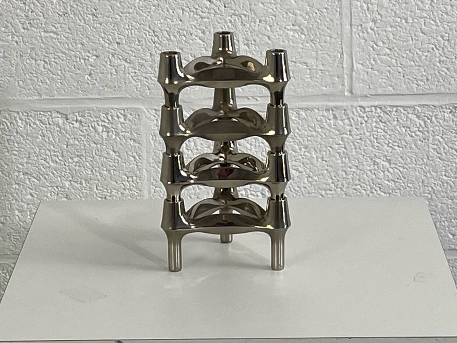 Series of 4 Nagel candlesticks