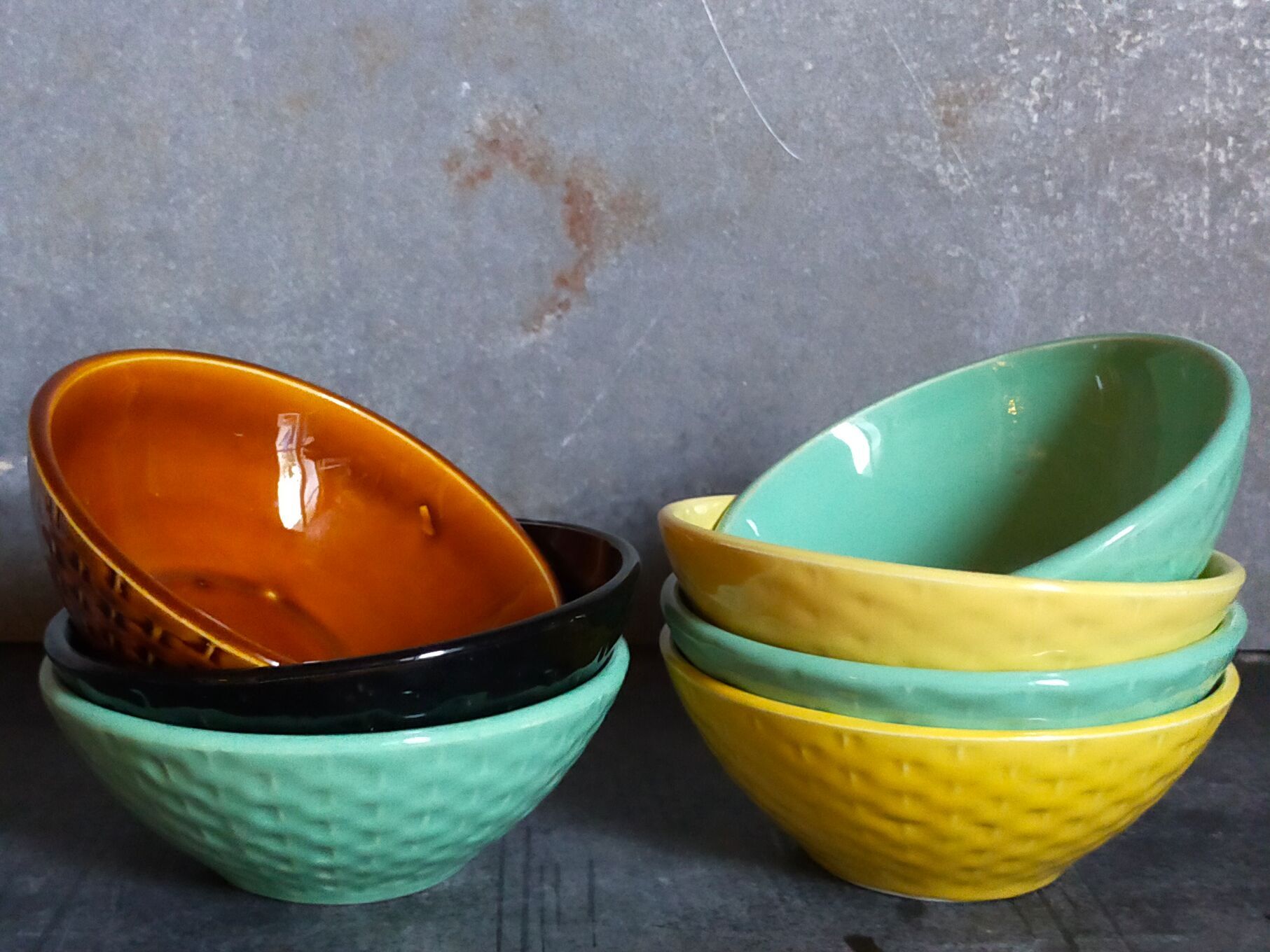 Seven vintage slip ceramic bowls