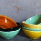 Seven vintage slip ceramic bowls