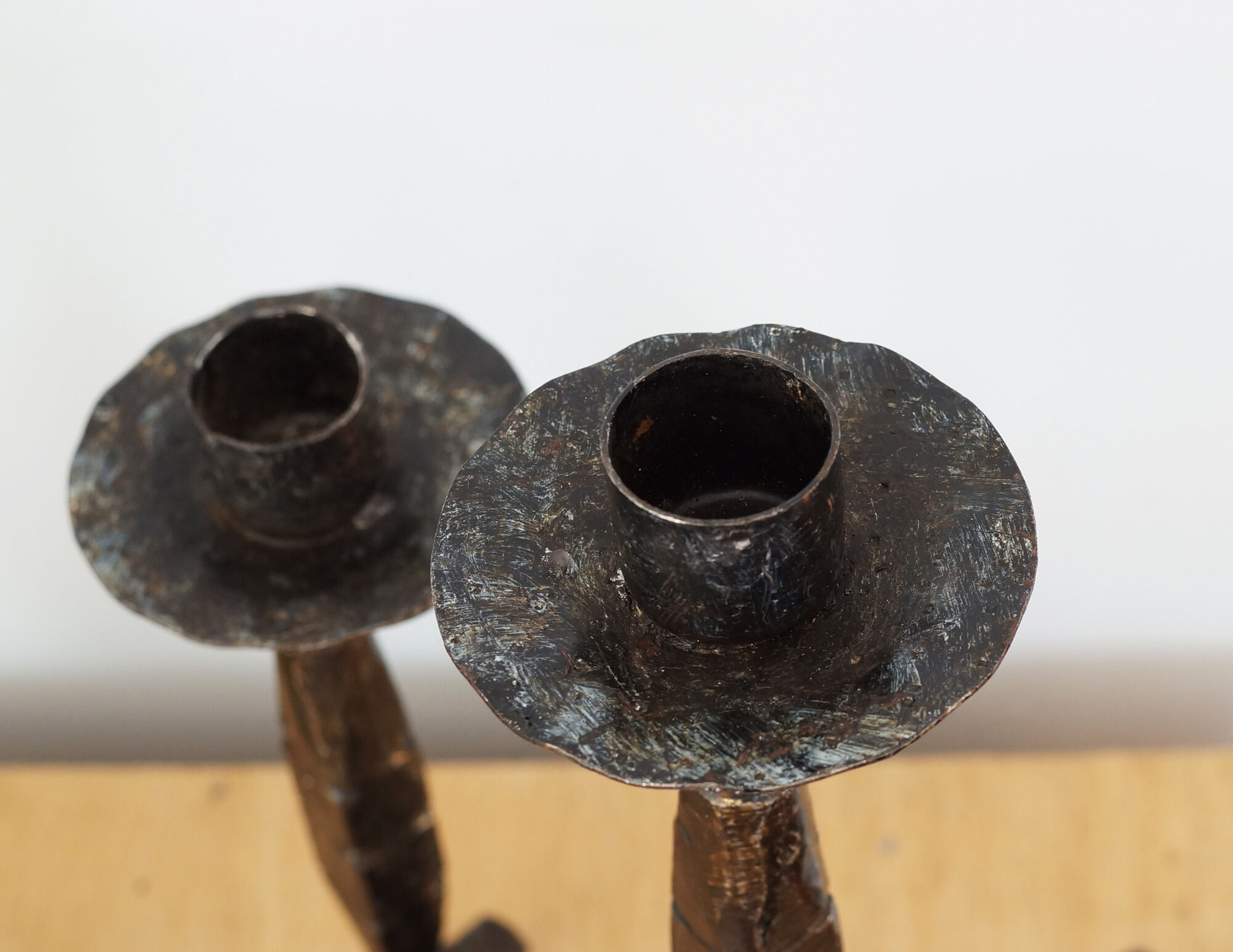 Pair of wrought iron candle holders, 60s