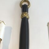 Pair of Black Lacquered Bronze Wall Lamps with Lions' Head Decorations. Around 1970