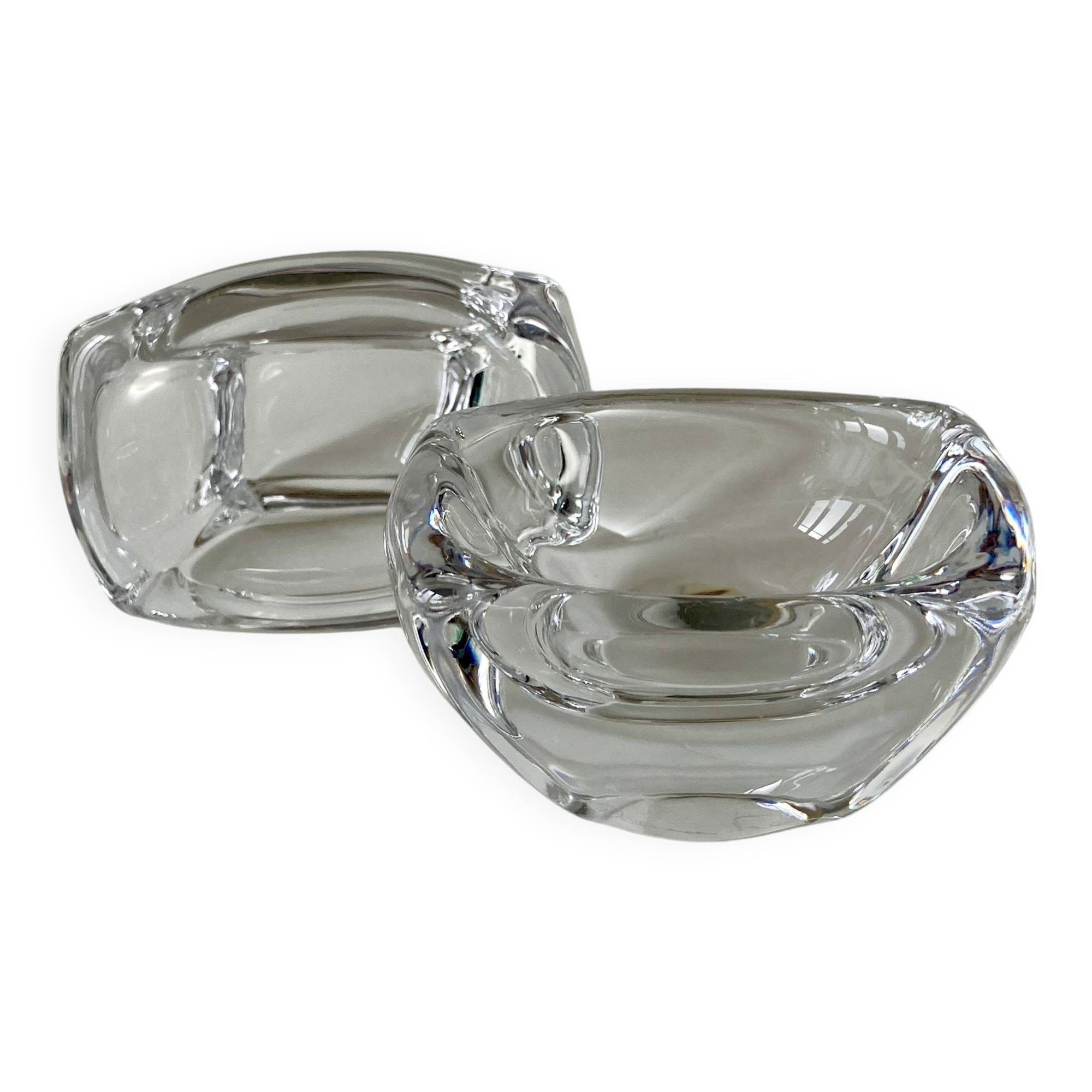 Pair of colourless crystal salt shakers from the Daum Nancy house.
