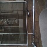 Chrome and smoked glass serving in the year 70