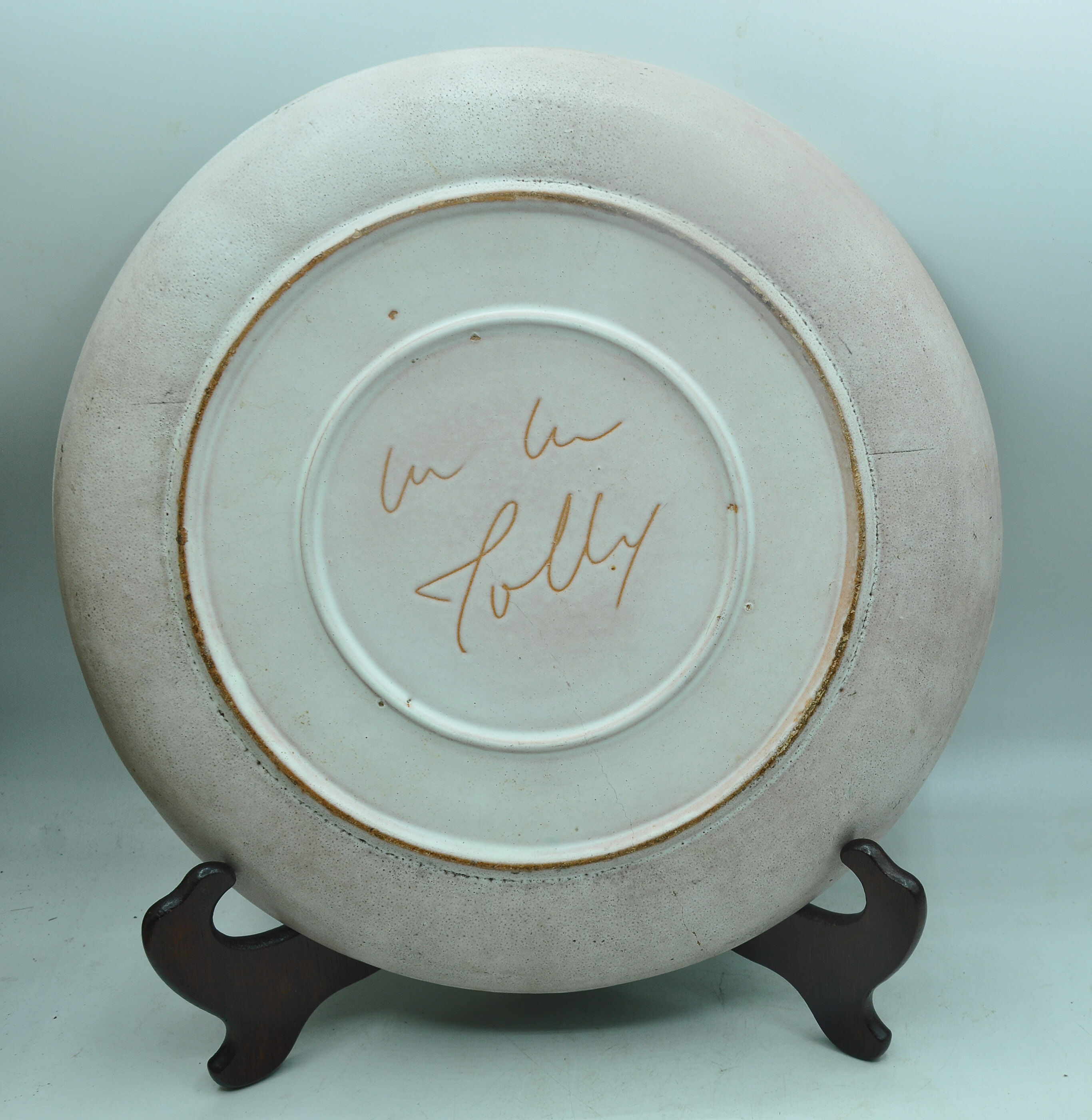 Assiette au portrait de femme signée Marie Madeleine Jolly à Vallauris