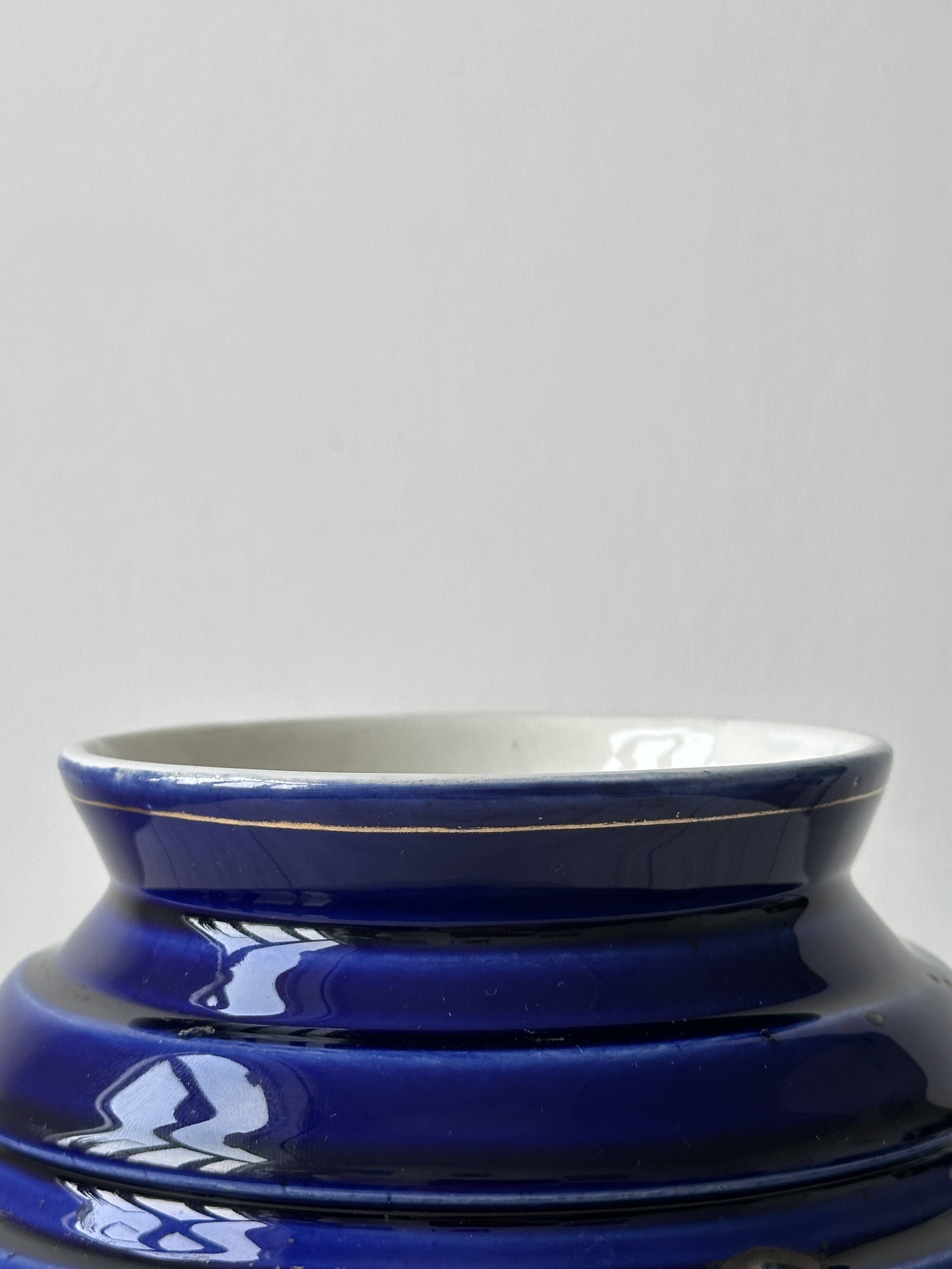 Royal blue vase with gold edging